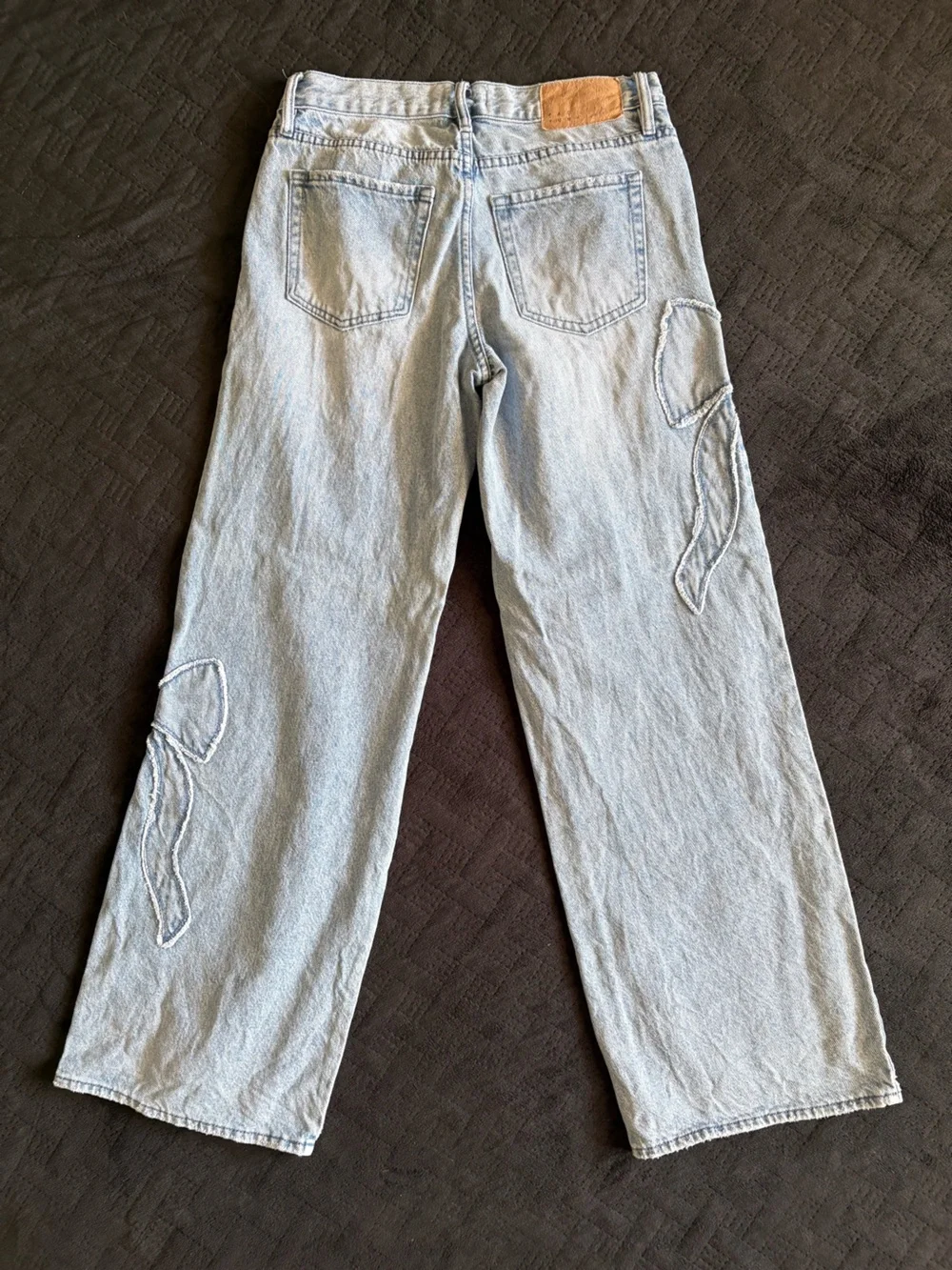 Casey low rise baggy Jeans with Embroidered Bow Detail